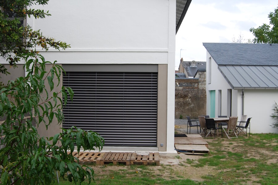 Projet Transformation d'un ancien atelier de menuiserie en habitation réalisé par un architecte Archidvisor