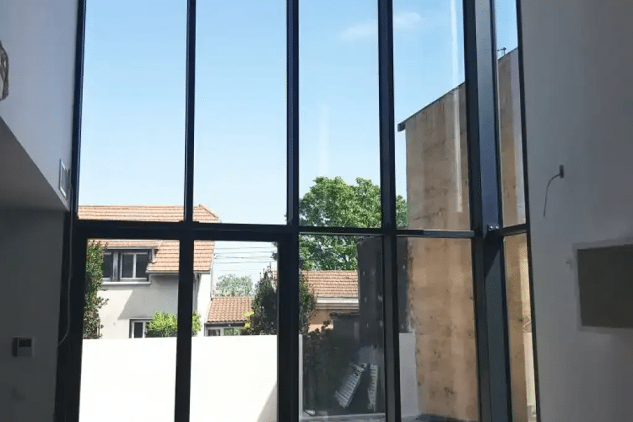Projet Construction d'une maison d'architecte avec toit terrasse à Oullins réalisé par un contractant général Archidvisor