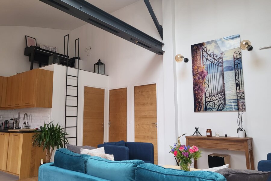 Projet Rénovation d’appartement Loft – Séjour cathédrale & mezzanine réalisé par un architecte Archidvisor