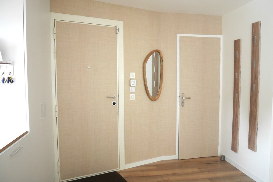 Projet Réaménagement d'un espace entrée WC salle à manger réalisé par un architecte d'intérieur Archidvisor